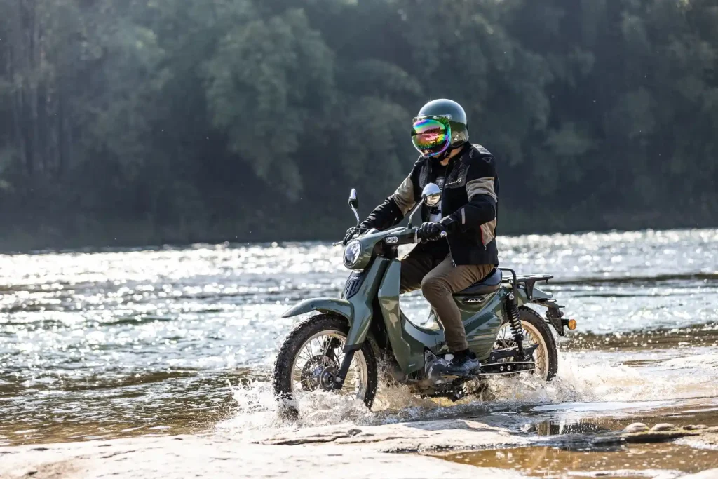 Discover the Kamax Cub X an adventure motorcycle inspired by the iconic Honda Cub. Learn about its design performance and why its poised to become a favorite among motorcycle enthusiasts wor