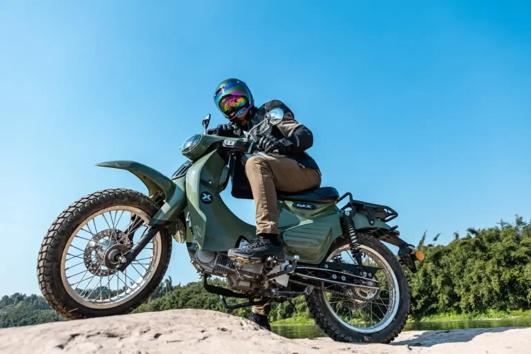 Discover the Kamax Cub X an adventure motorcycle inspired by the iconic Honda Cub. Learn about its design performance and why its poised to become a favorite among motorcycle enthusiasts wor 1