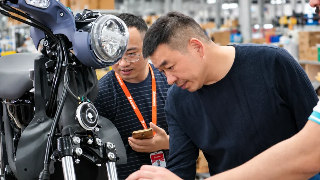Motorcycle Spare Parts & After-Sales Support - China OEM Motorcycle Manufacturer KAMAX's Hugo and technical team conducting an on-site motorcycle inspection at the factory.